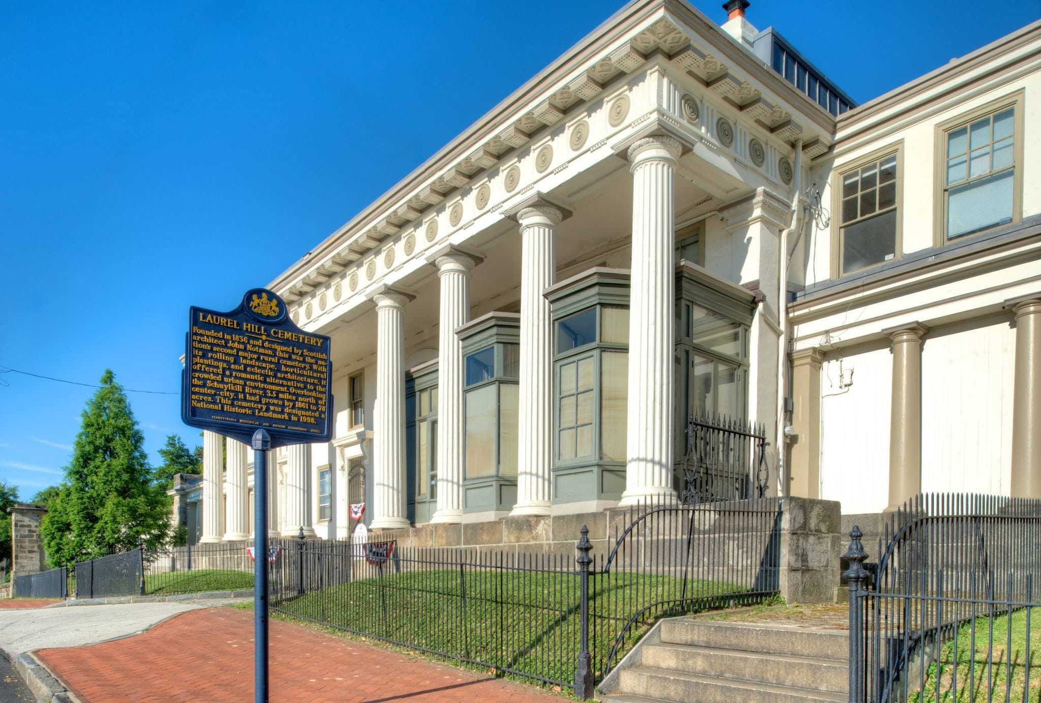 The gatehouse at Laurel Hill Cemetery — John Notman's Roman arch and colonnade on Ridge Avenue, the main entrance since 1836.
