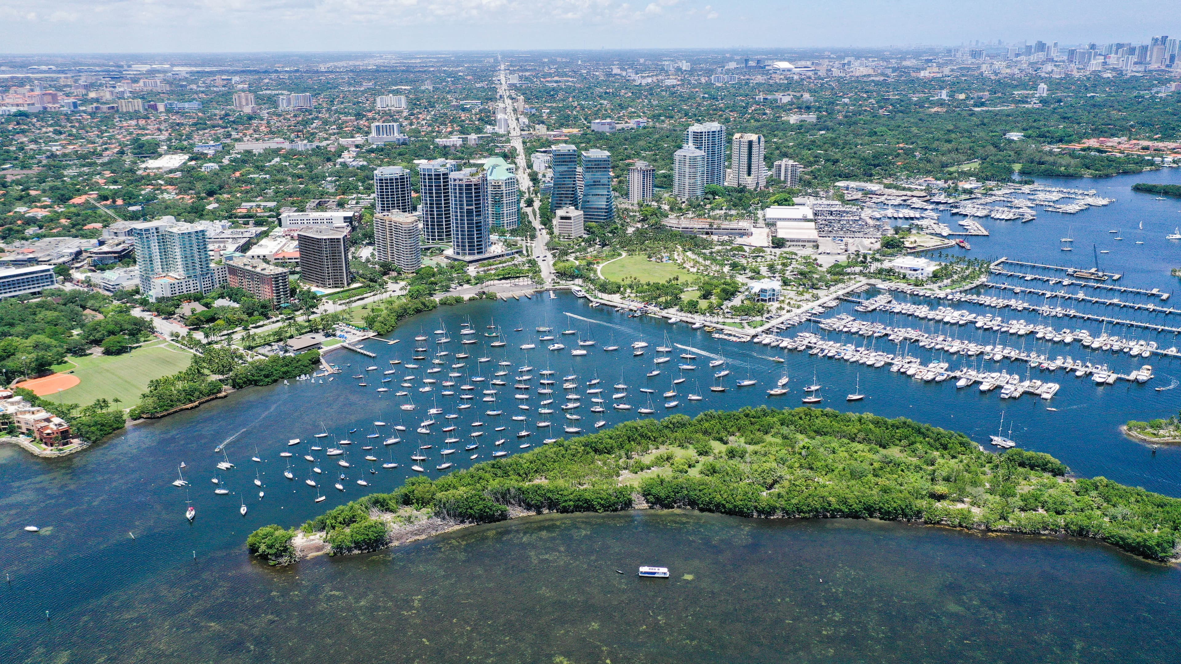 Downtown Coconut Grove in 2019, aerial view with Dinner Key in the foreground