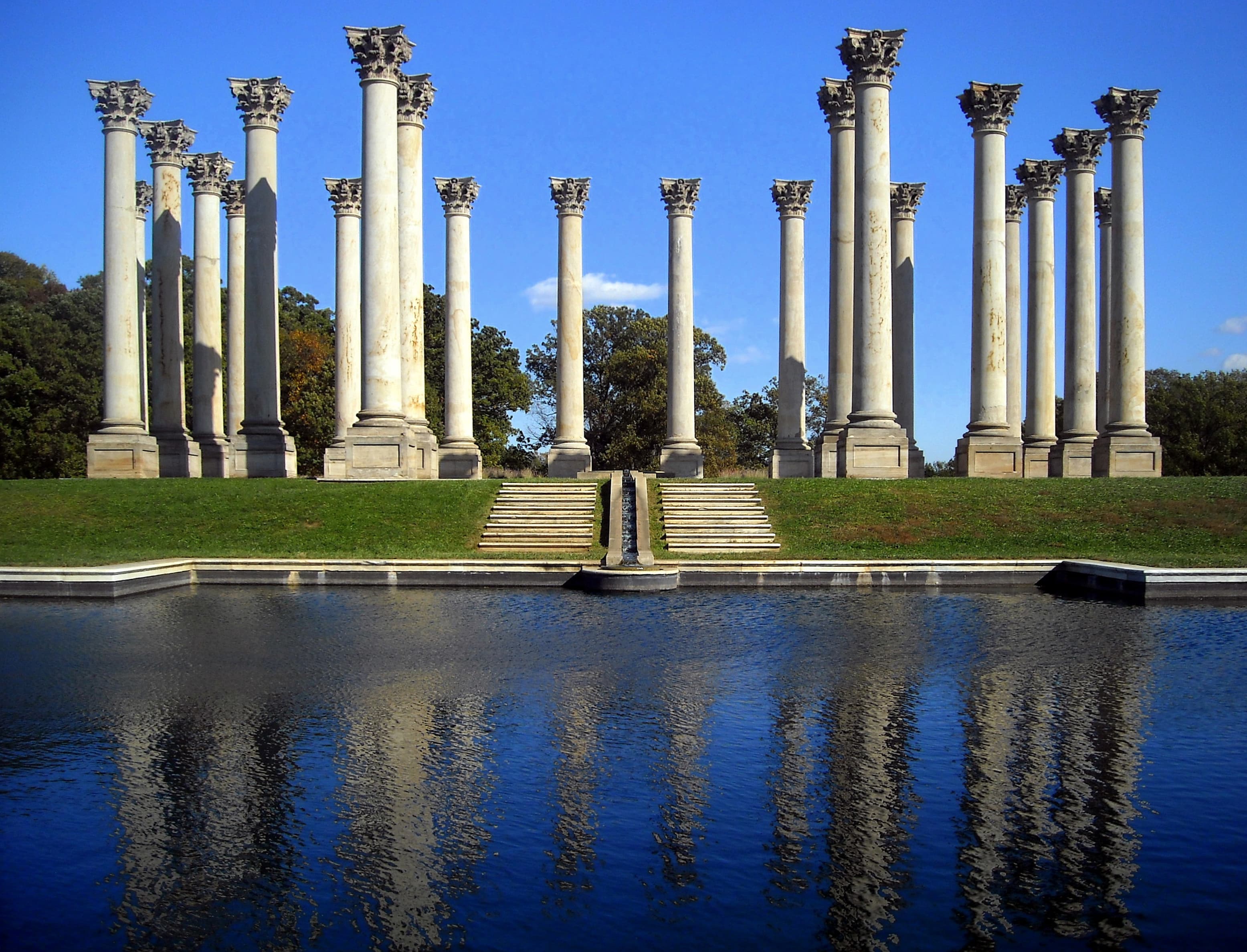 The National Capitol Columns in the Ellipse Meadow at the U.S. National Arboretum, with the reflecting pool