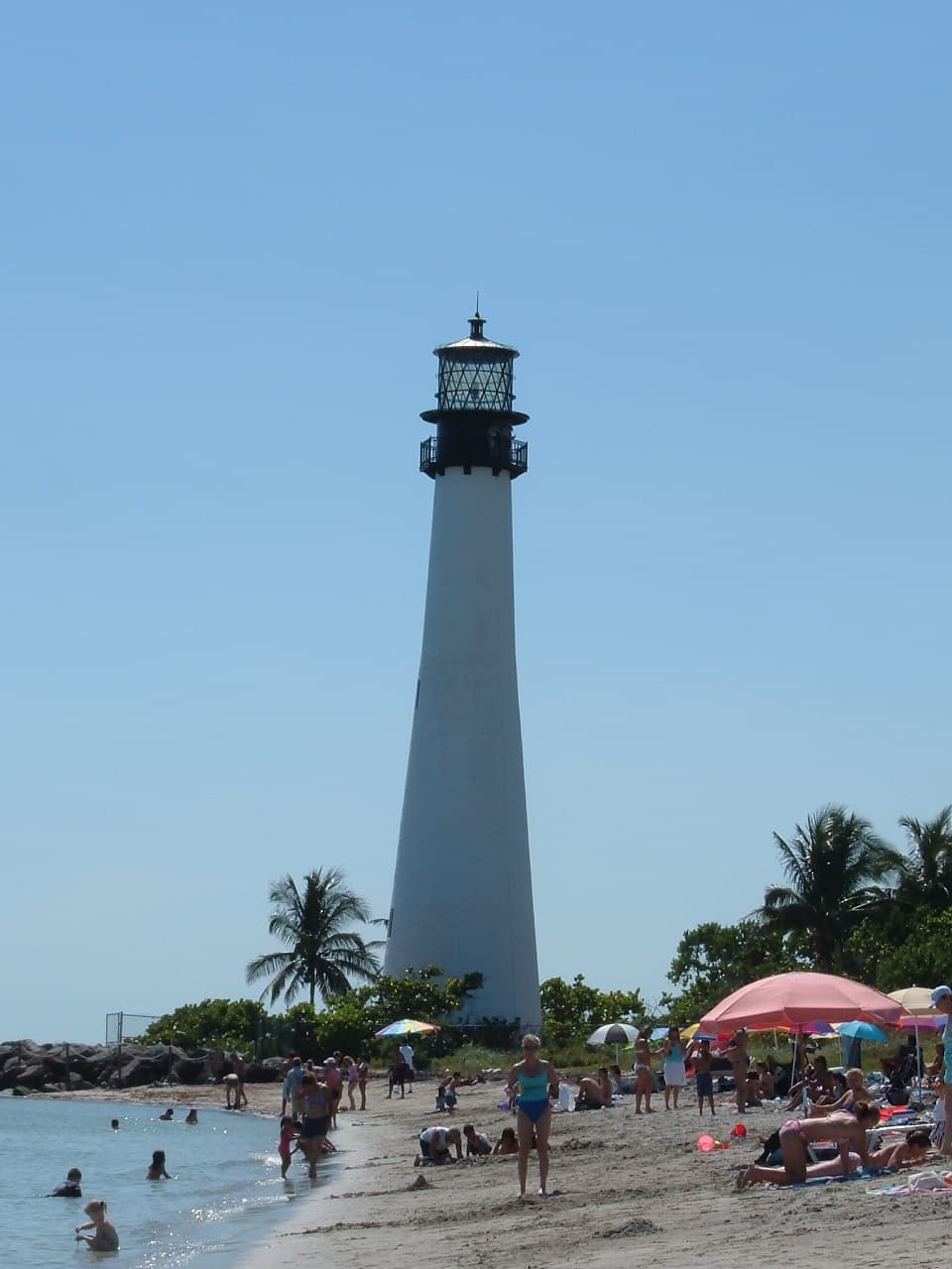 The Cape Florida Lighthouse at the southern tip of Key Biscayne — the 1846 tower, raised in 1855, and the oldest standing structure in Miami-Dade County.