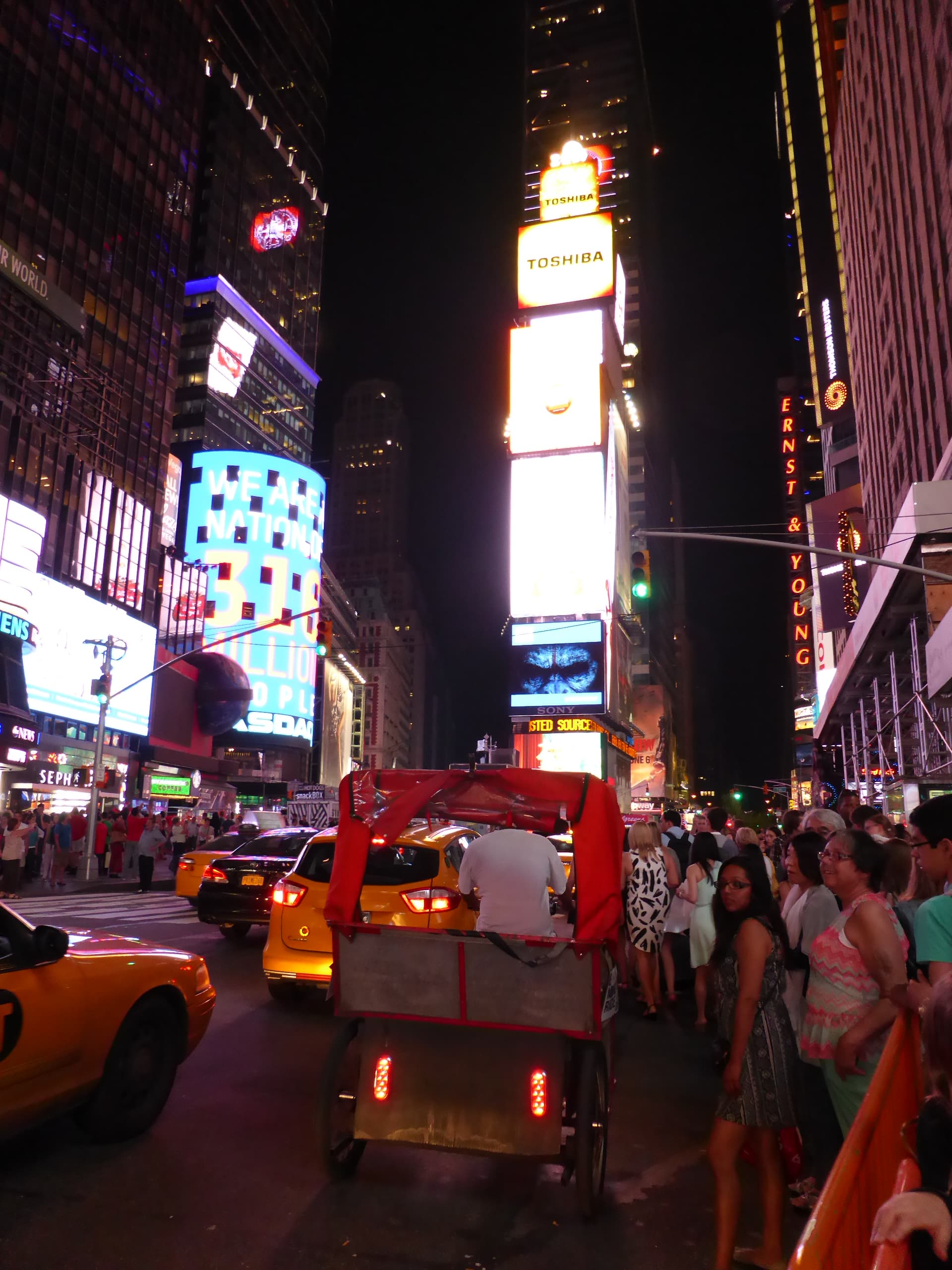 Times Square in New York City at night, photographed July 9, 2014 — a general night view of the square and its illuminated signs
