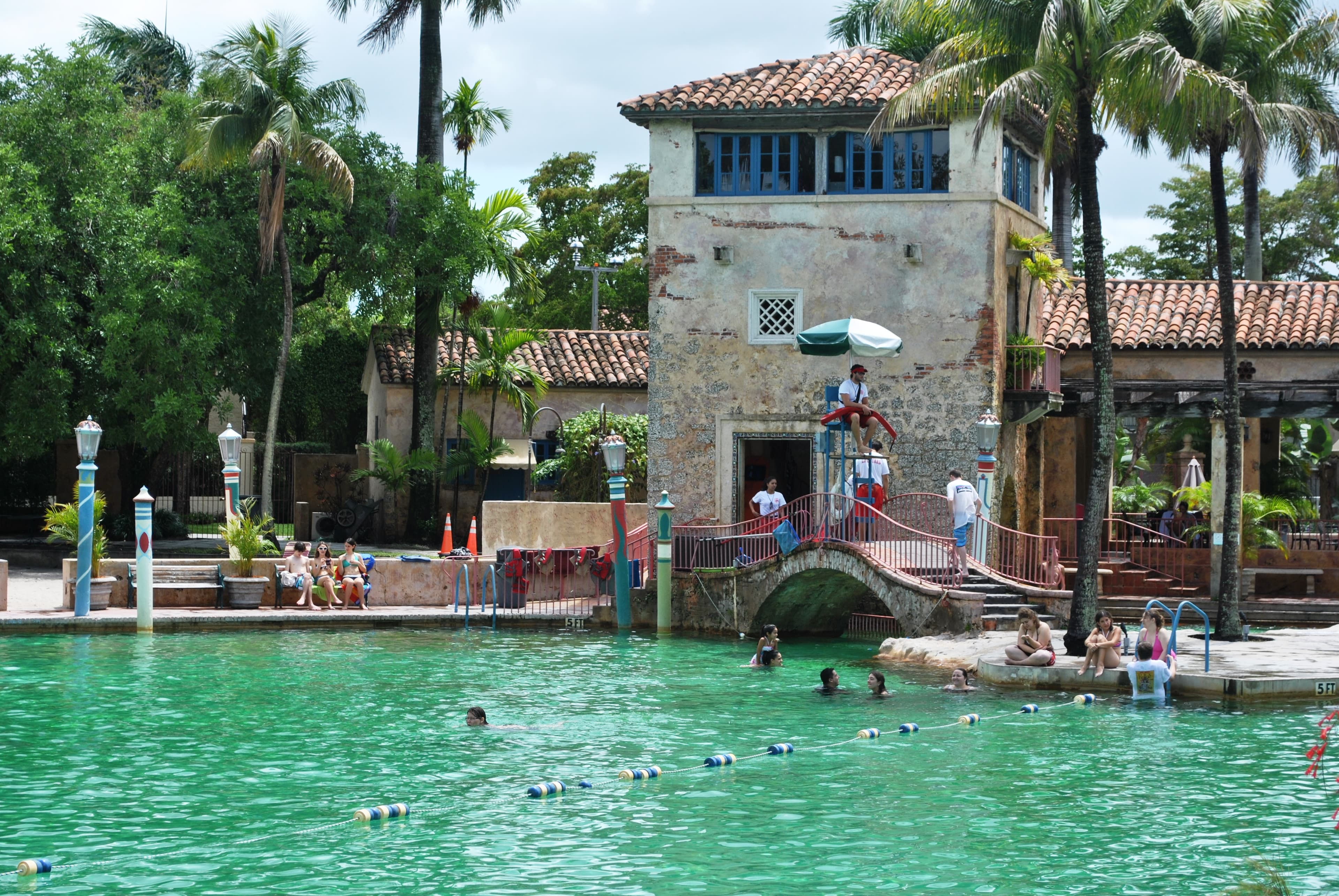 The Venetian Pool in Coral Gables — a lagoon of spring-fed water inside the 1924 coral rock quarry, with its waterfalls and lookout towers.