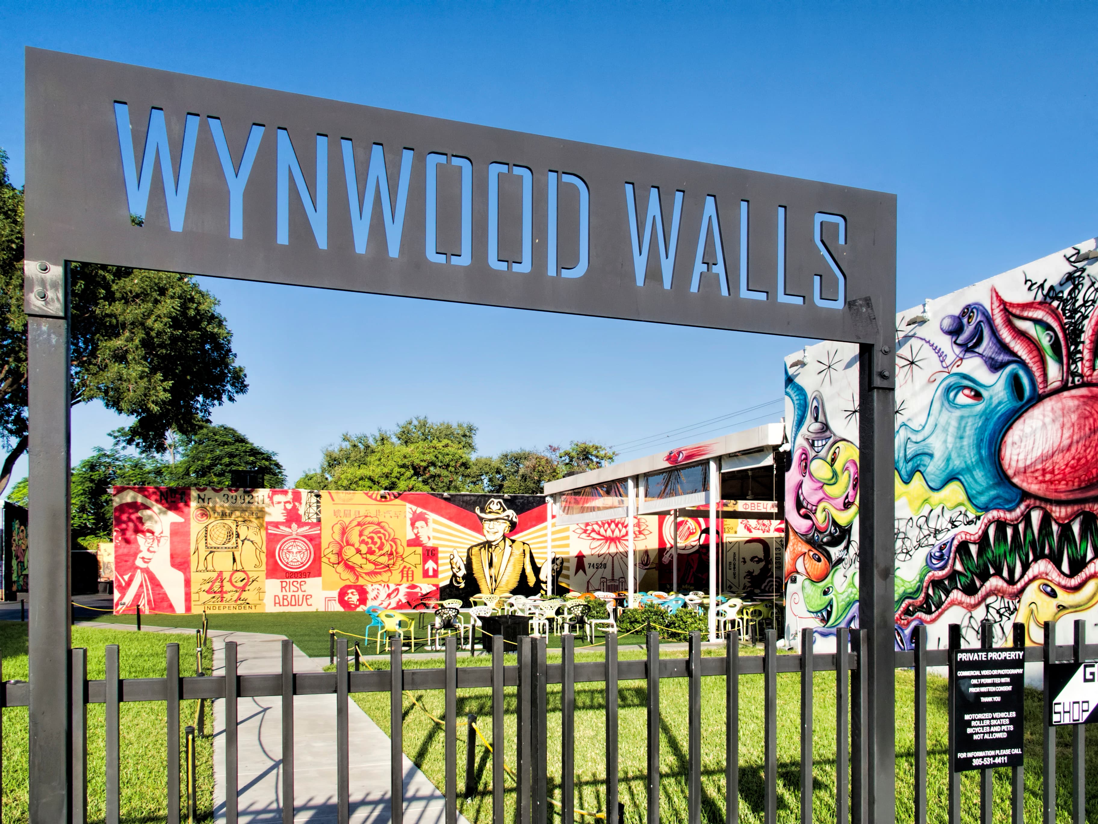 The mural-covered buildings around the plaza at Wynwood Walls, photographed October 2013.