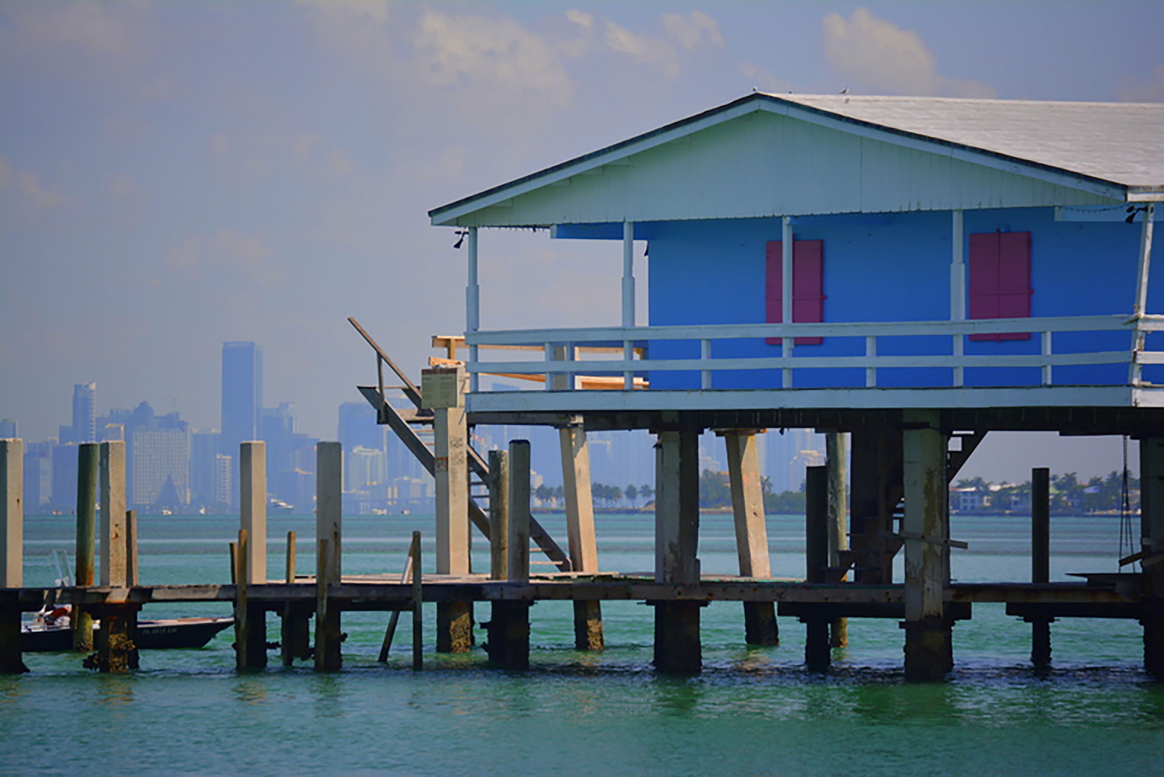 A Stiltsville house standing on pilings over the shallows of Biscayne Bay, south of Key Biscayne.