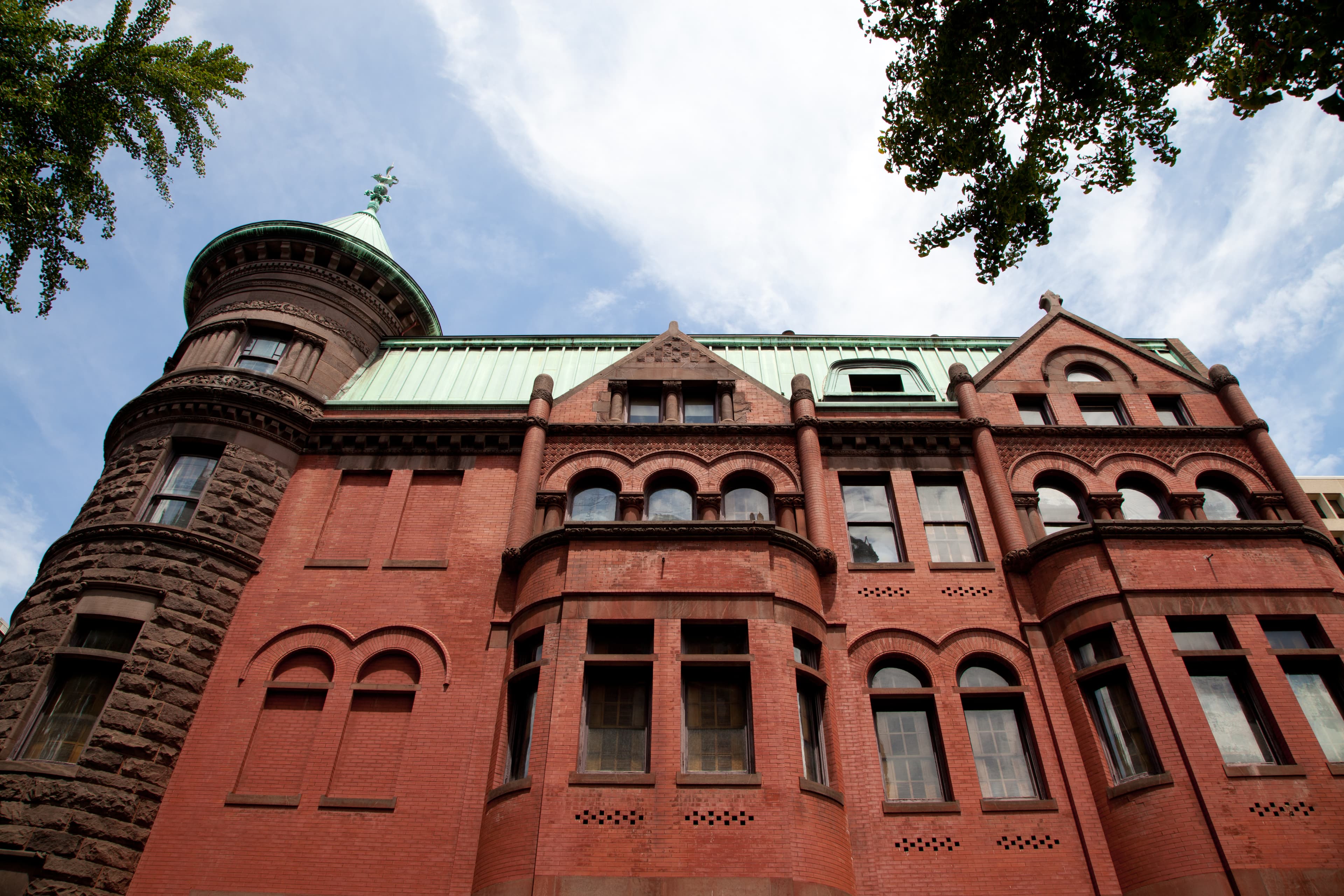 The Christian Heurich Mansion — the Brewmaster's Castle — on New Hampshire Avenue in Dupont Circle, its stone turrets and Richardsonian Romanesque bulk intact since 1894.