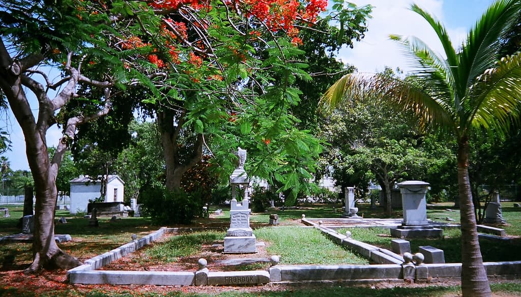 Miami City Cemetery — the ten-acre municipal burial ground founded in 1897, shaded by palms and gumbo limbo trees north of downtown.